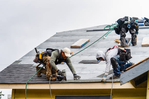 Professional Roof Replacement technician working in Richland, NY
